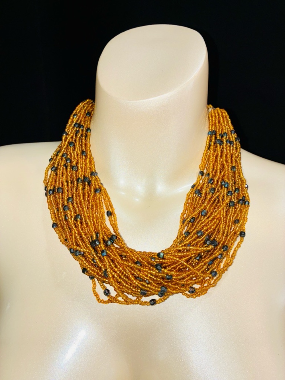 Warm Gold Multi-Strand Seed Bead Necklace with Dark Accent Beads